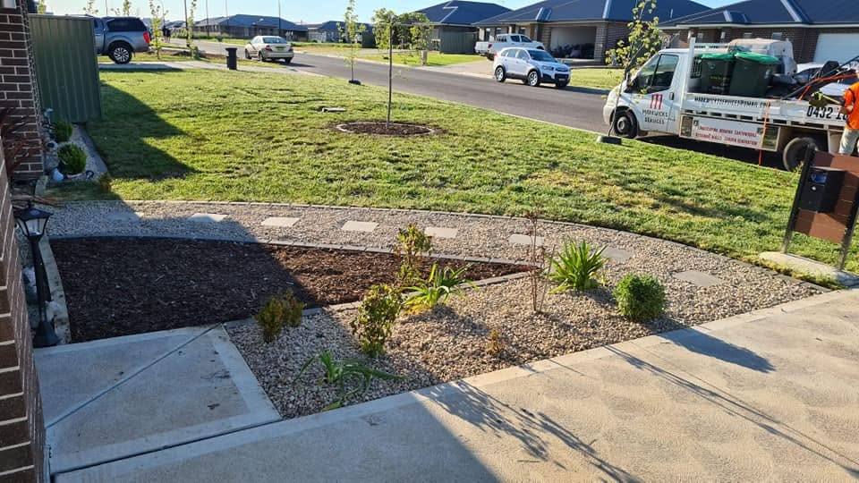 Completed front yard landscaping and garden bed makeover